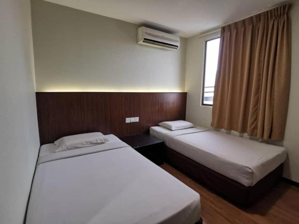 Hotel Holiday Kota Kinabalu Extérieur photo